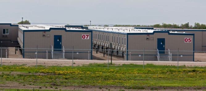 Owner of ICE detention facility sees big opportunity in AI man camps